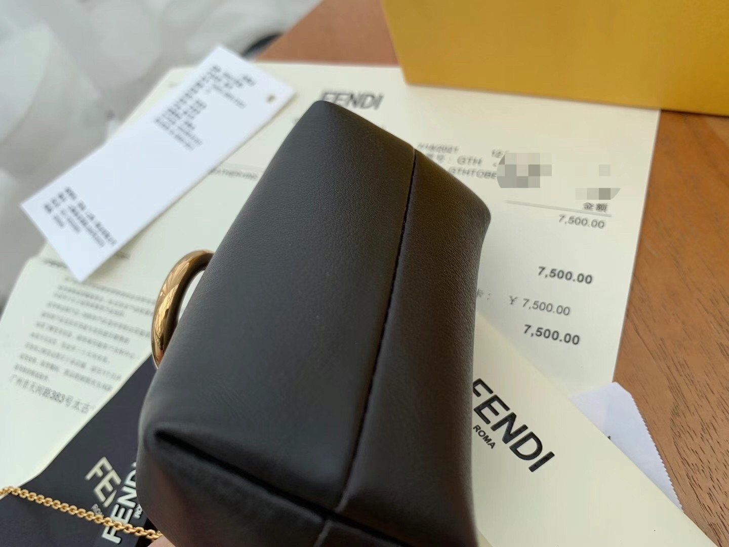 F**di first nano charm bag in black nappa leather