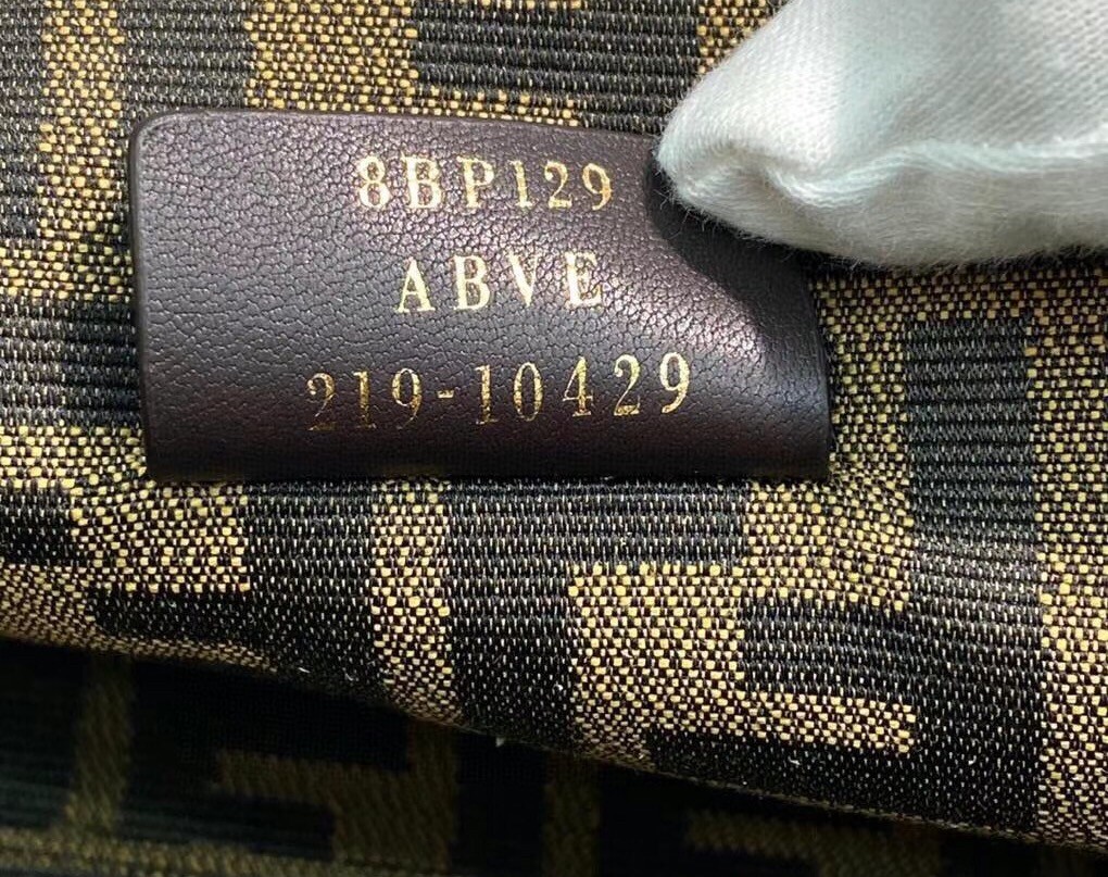 F**di small first bag in beige python leather