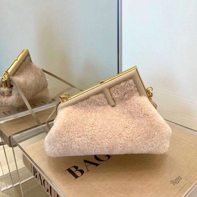 F**di small first bag in pink wool sheepskin