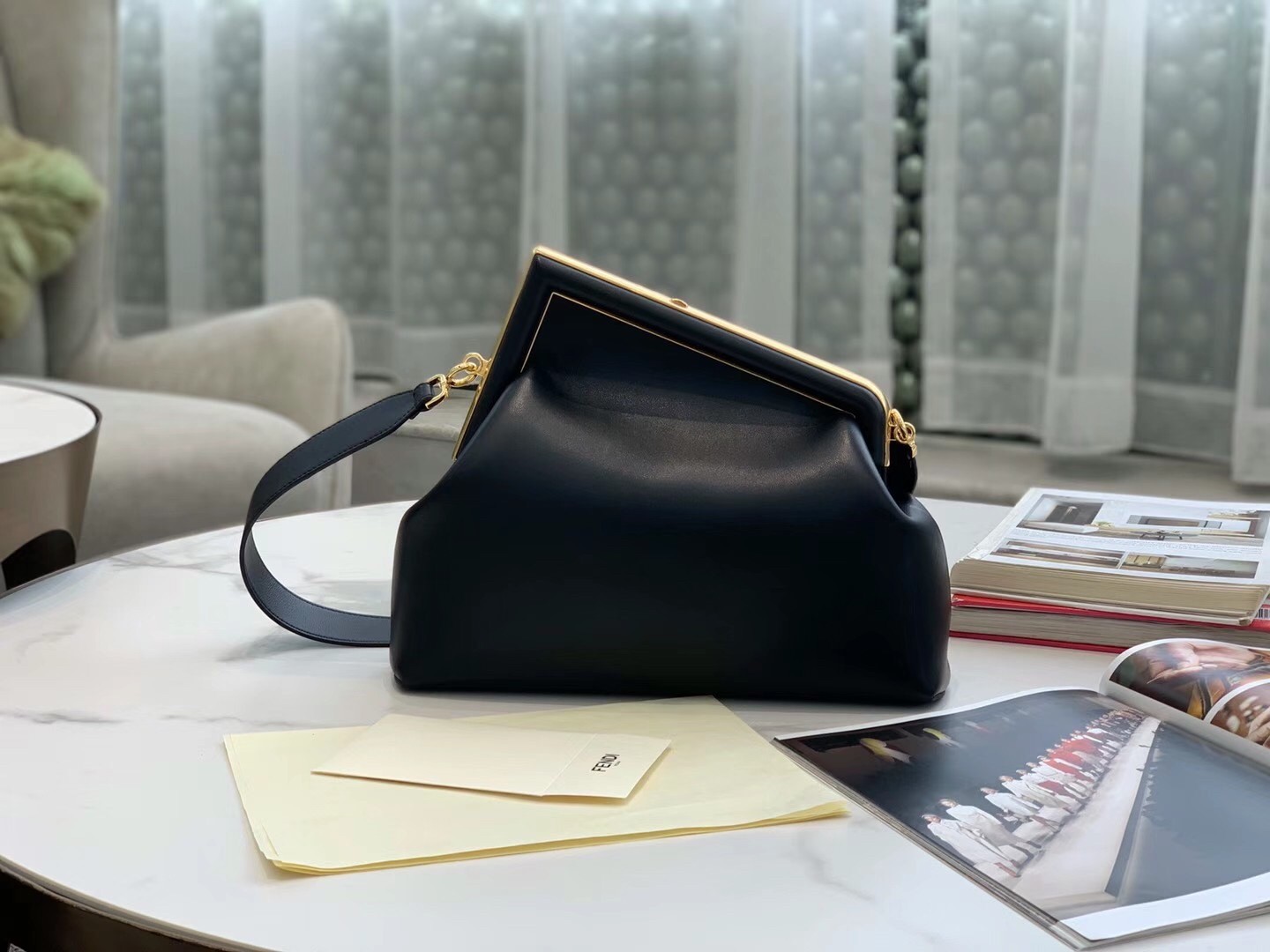F**di medium first bag in black nappa leather