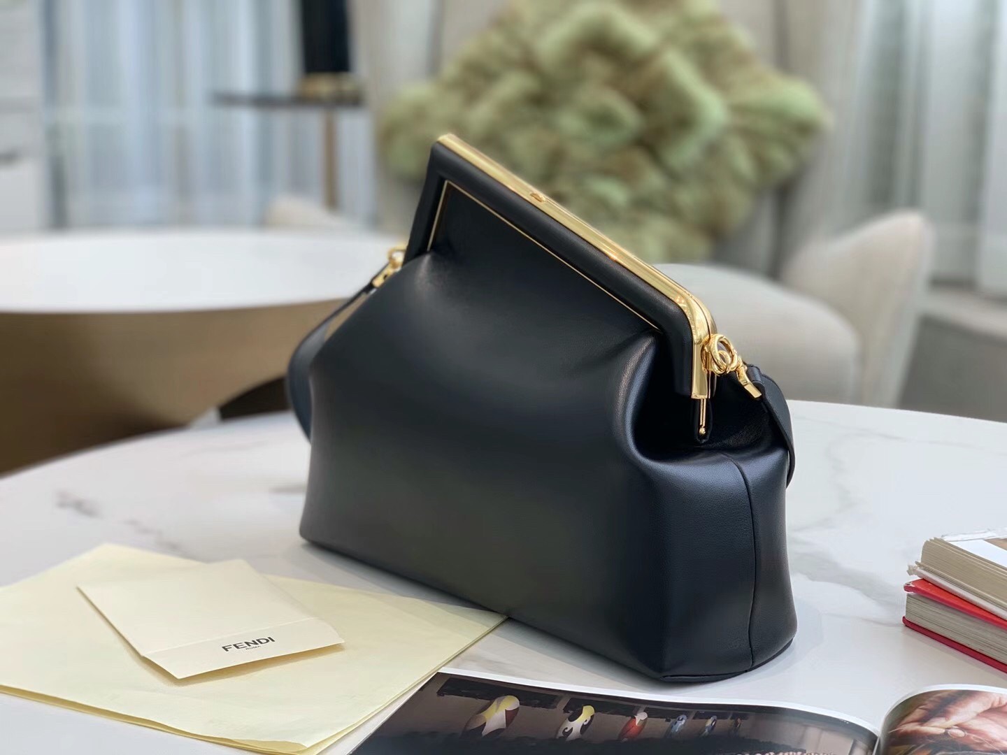 F**di medium first bag in black nappa leather