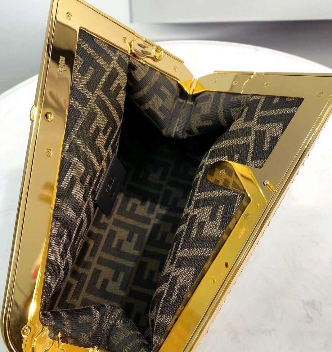 F**di medium first bag in natural python leather