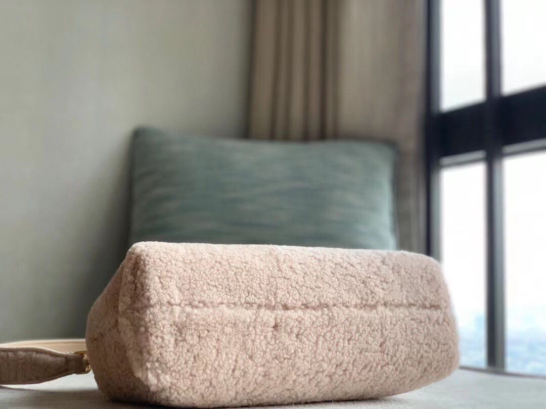 F**di medium first bag in pink wool sheepskin