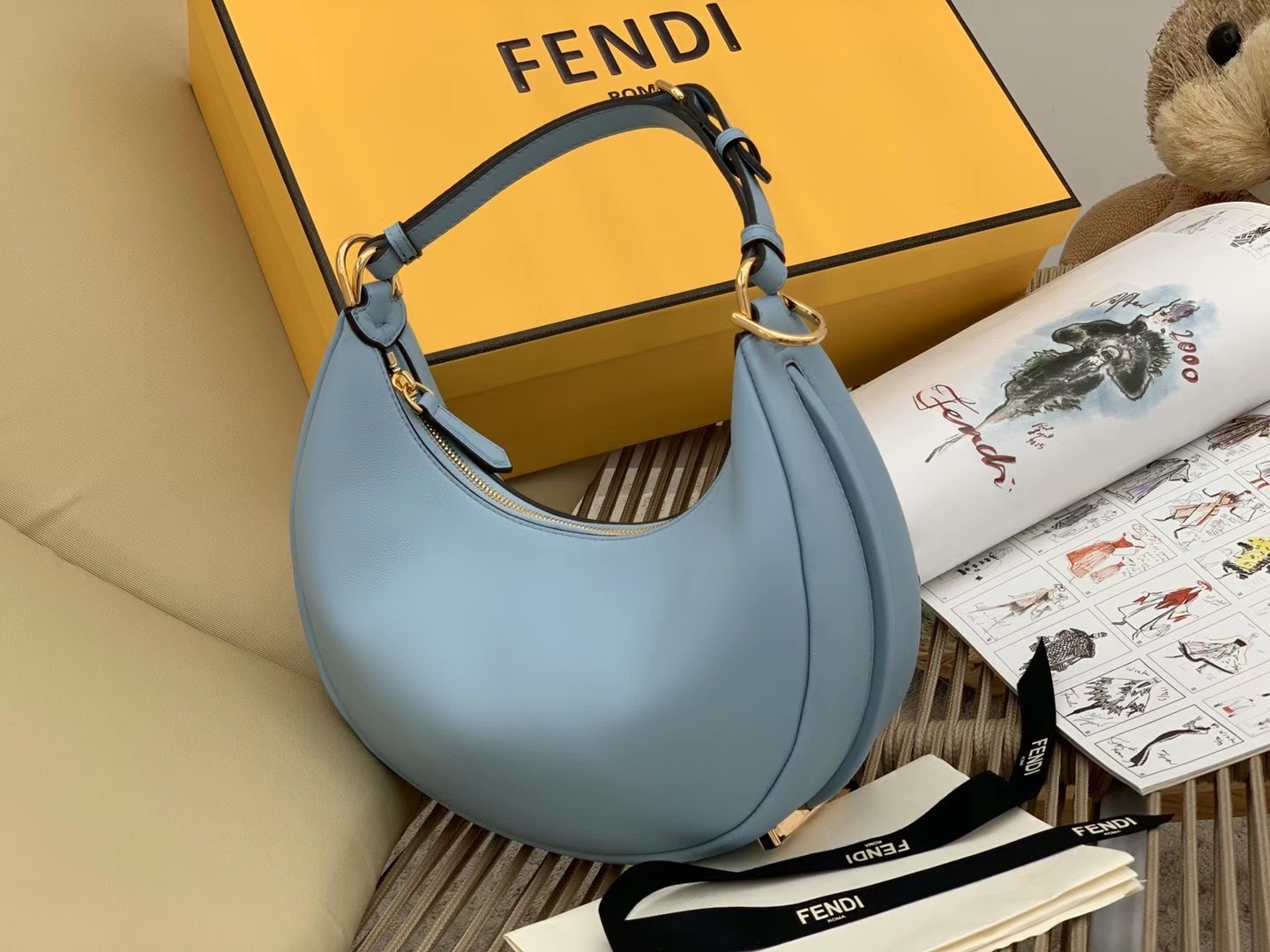 F**di F**digraphy small hobo bag in light blue leather