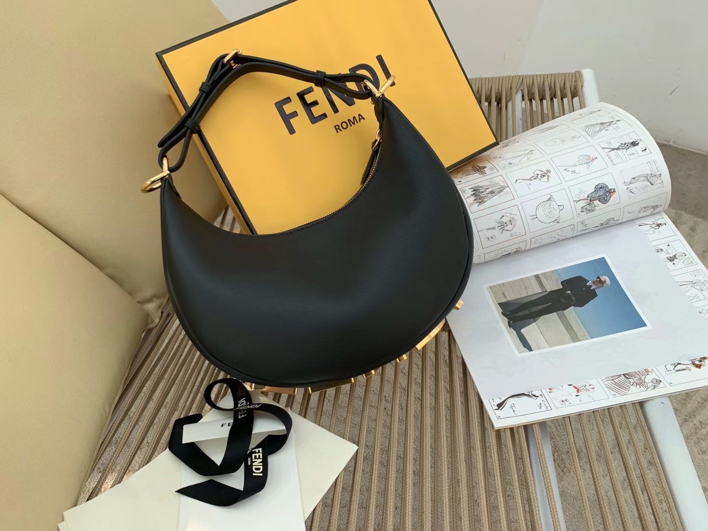 F**di F**digraphy small hobo bag in black leather