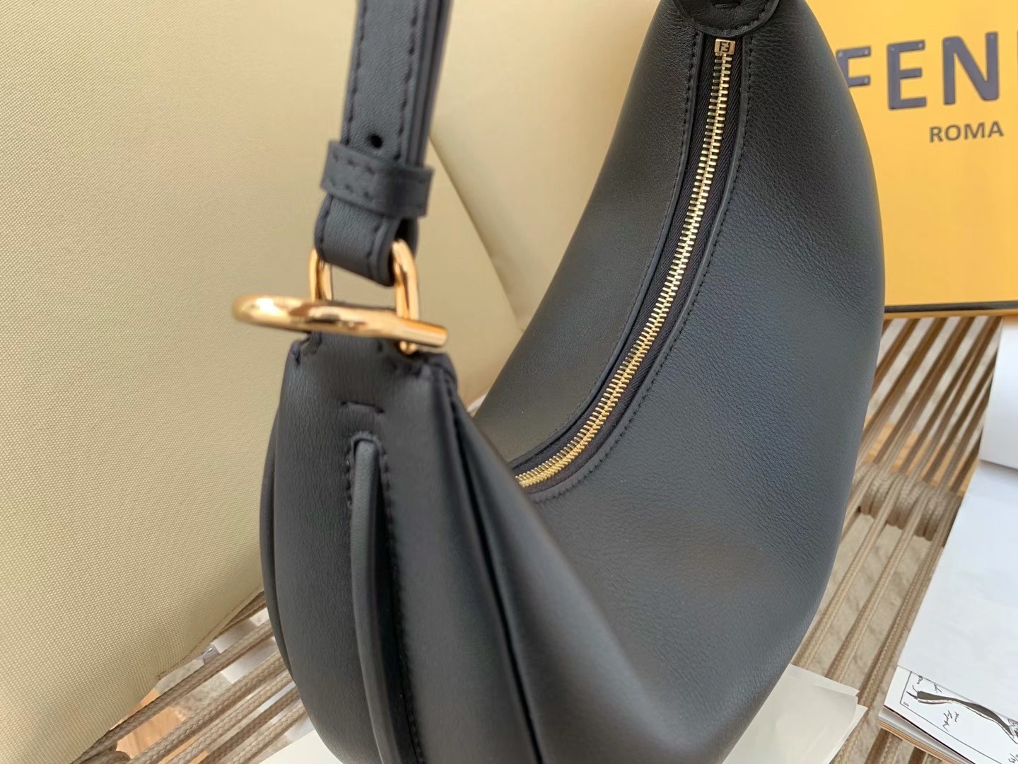F**di F**digraphy small hobo bag in black leather