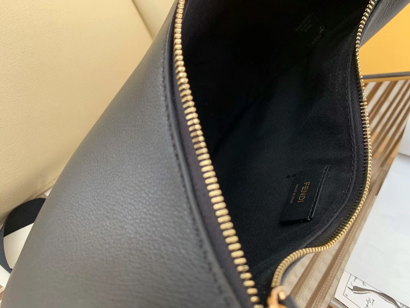 F**di F**digraphy small hobo bag in black leather