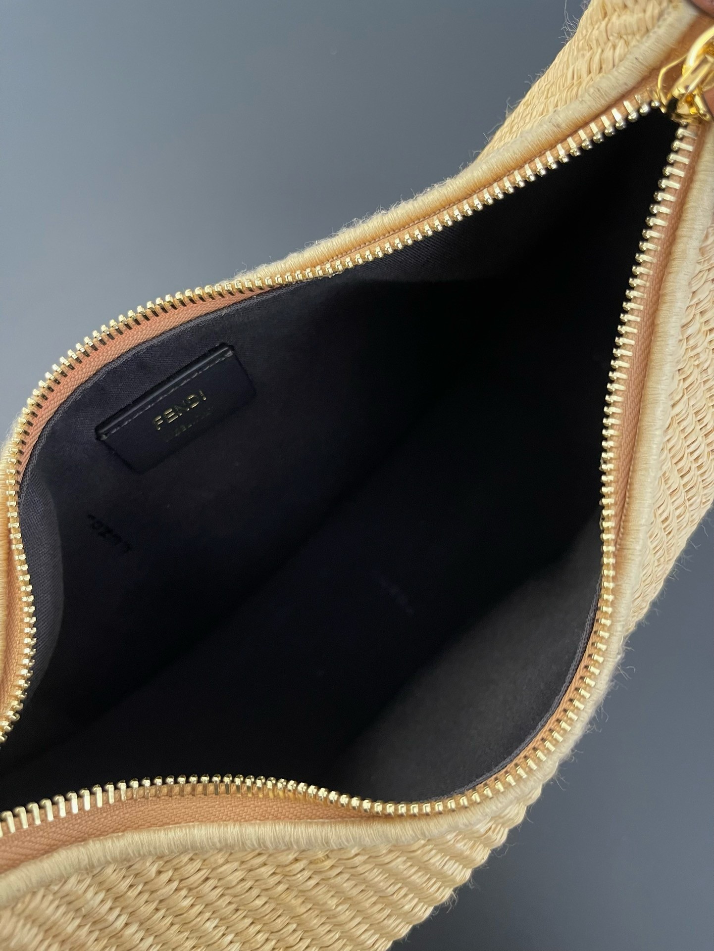 F**di F**digraphy small hobo bag in natural raffia
