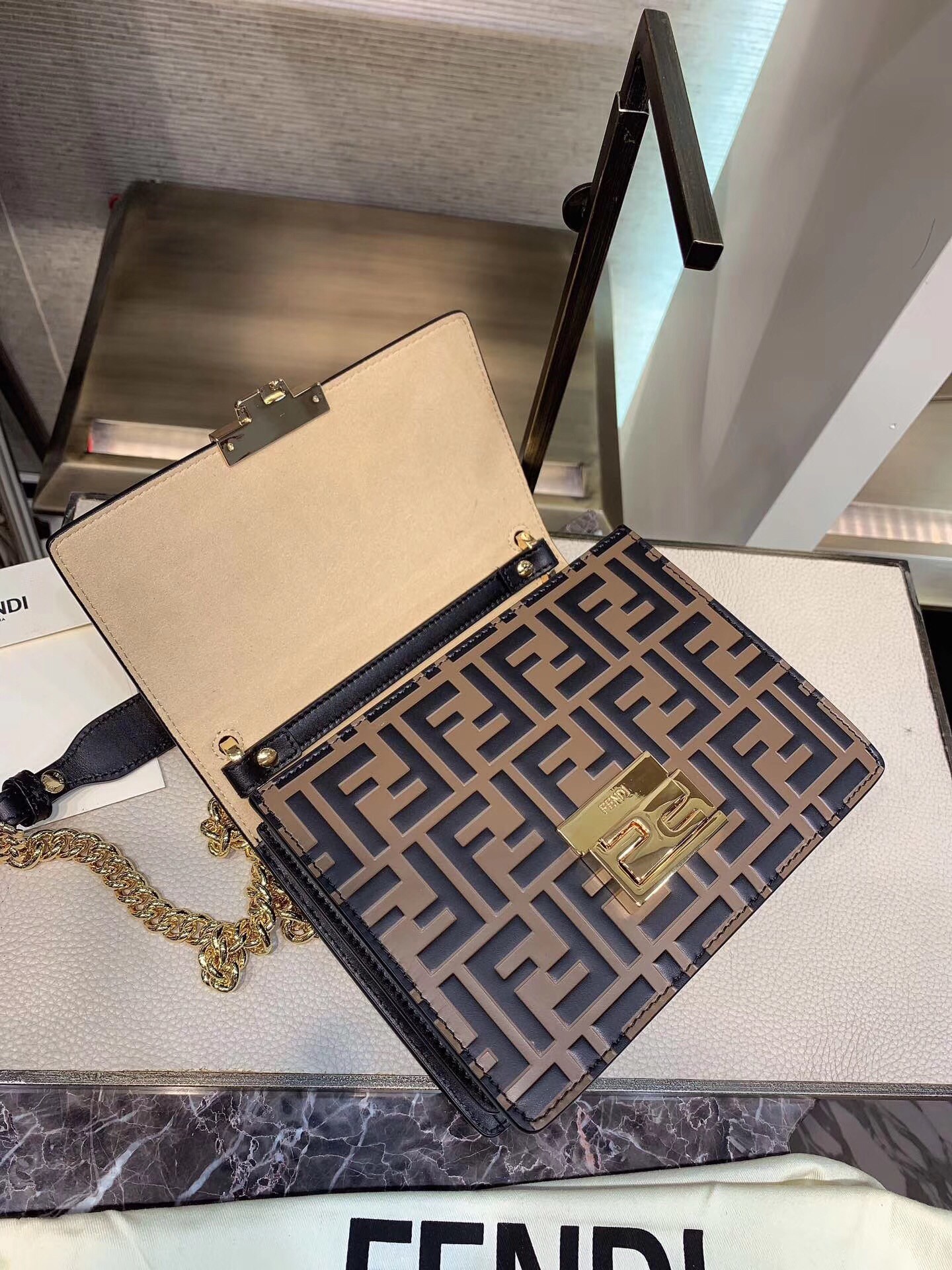 F**di small kan u bag in calfskin embossed with ff
