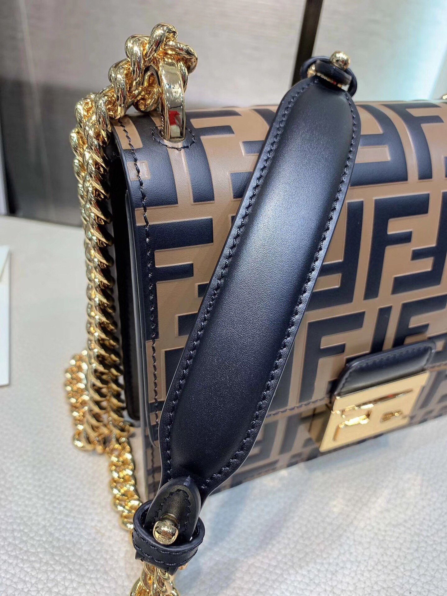 F**di small kan u bag in calfskin embossed with ff