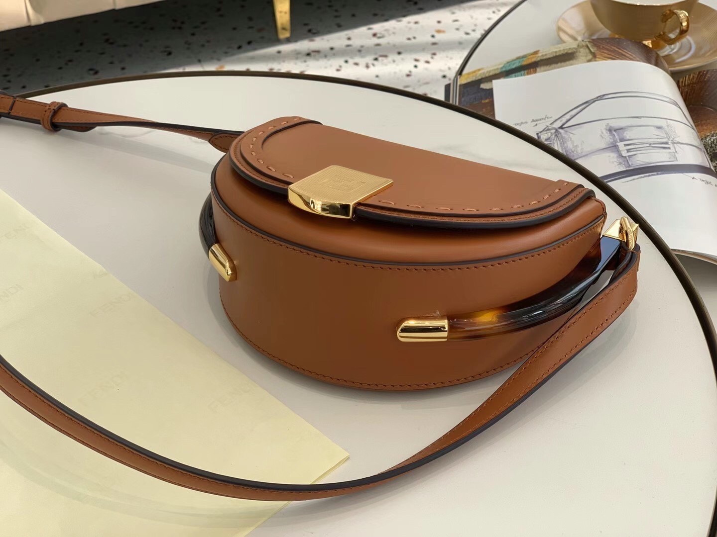 F**di moonlight saddle bag in brown calfskin