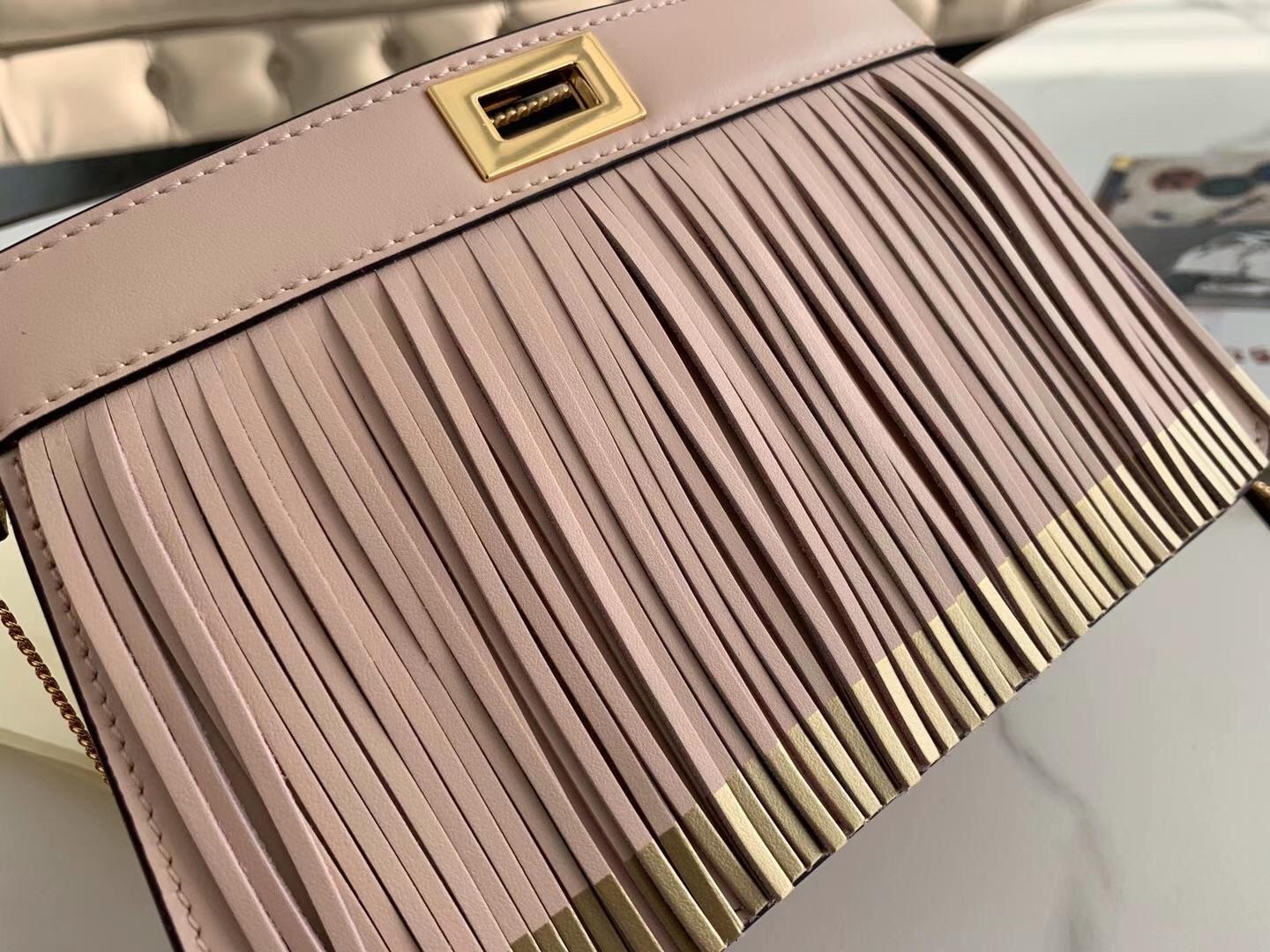 F**di pink peekaboo iseeu pochette bag with fringes
