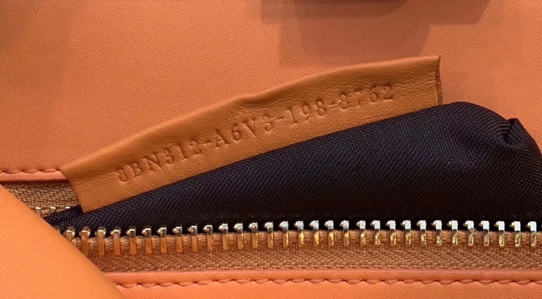 F**di peekaboo pocket medium bag in orange calfskin