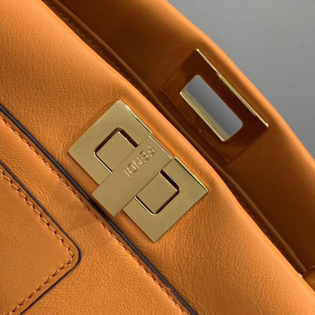 F**di peekaboo mini pocket bag in orange calfskin