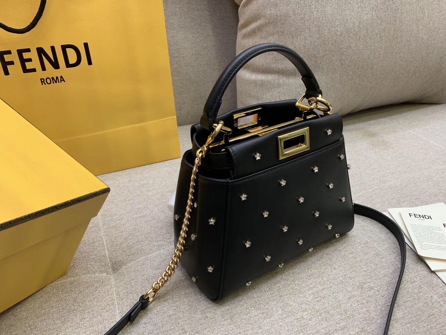 F**di peekaboo xs bag with star studs in black nappa leather