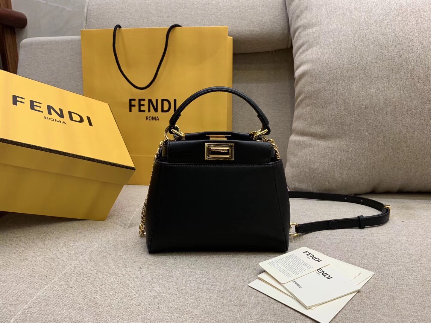 F**di peekaboo xs bag with star studs in black nappa leather