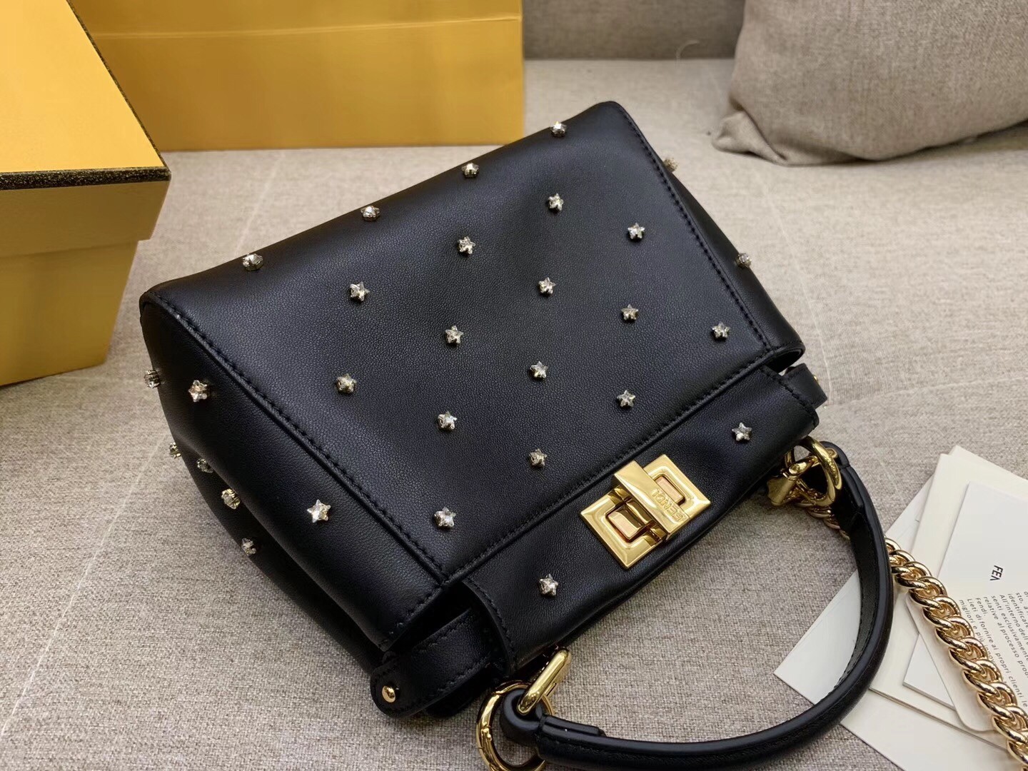 F**di peekaboo xs bag with star studs in black nappa leather