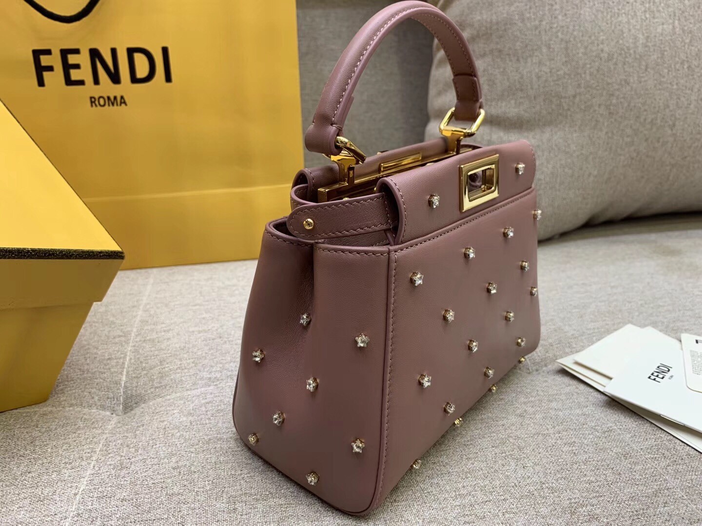 F**di peekaboo xs bag with star studs in black nappa leather