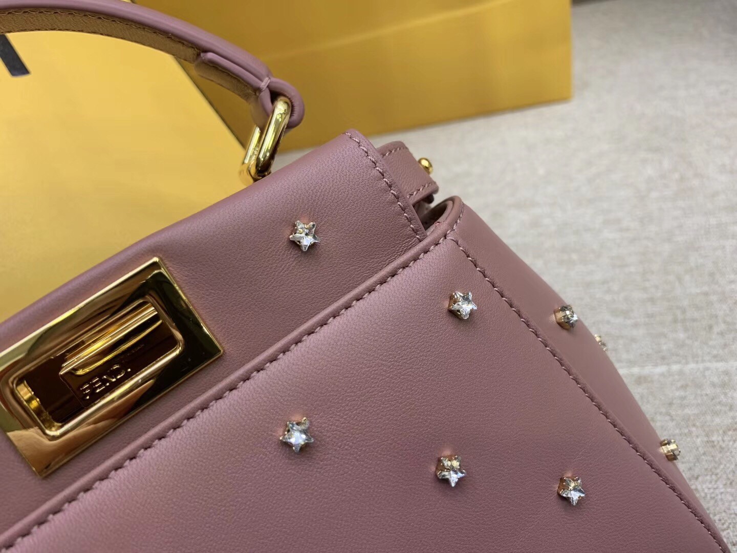 F**di peekaboo xs bag with star studs in black nappa leather