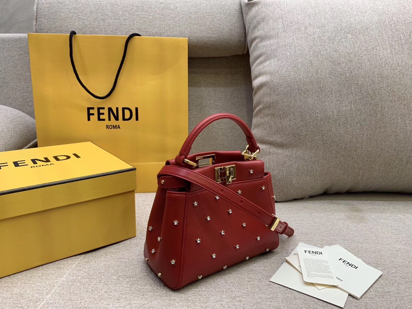 F**di peekaboo xs bag with star studs in red nappa leather