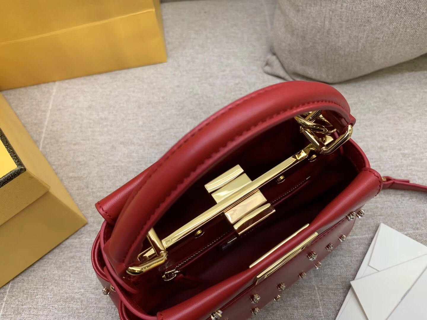 F**di peekaboo xs bag with star studs in red nappa leather