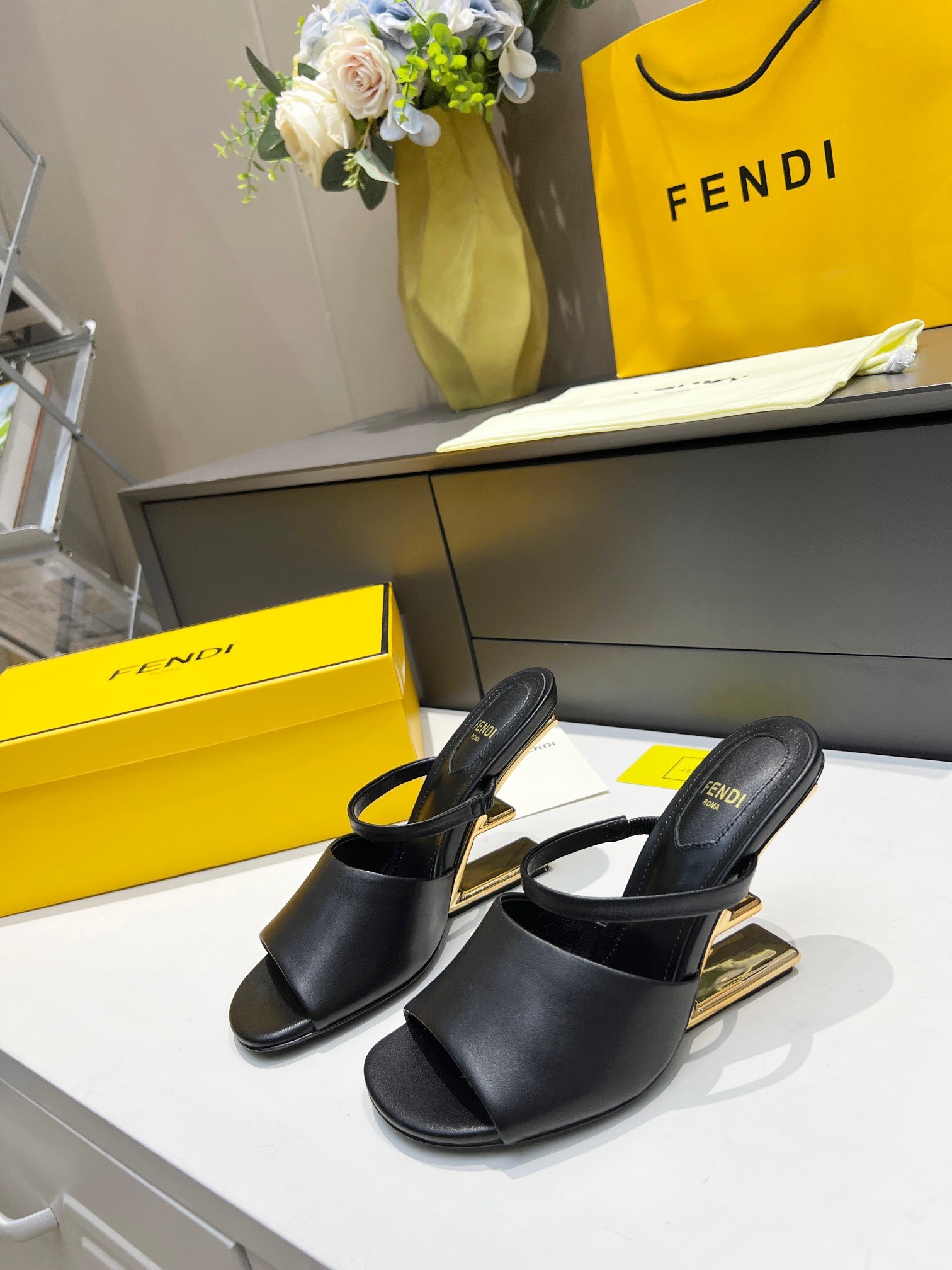 F**di first sandals 95mm in black calfskin