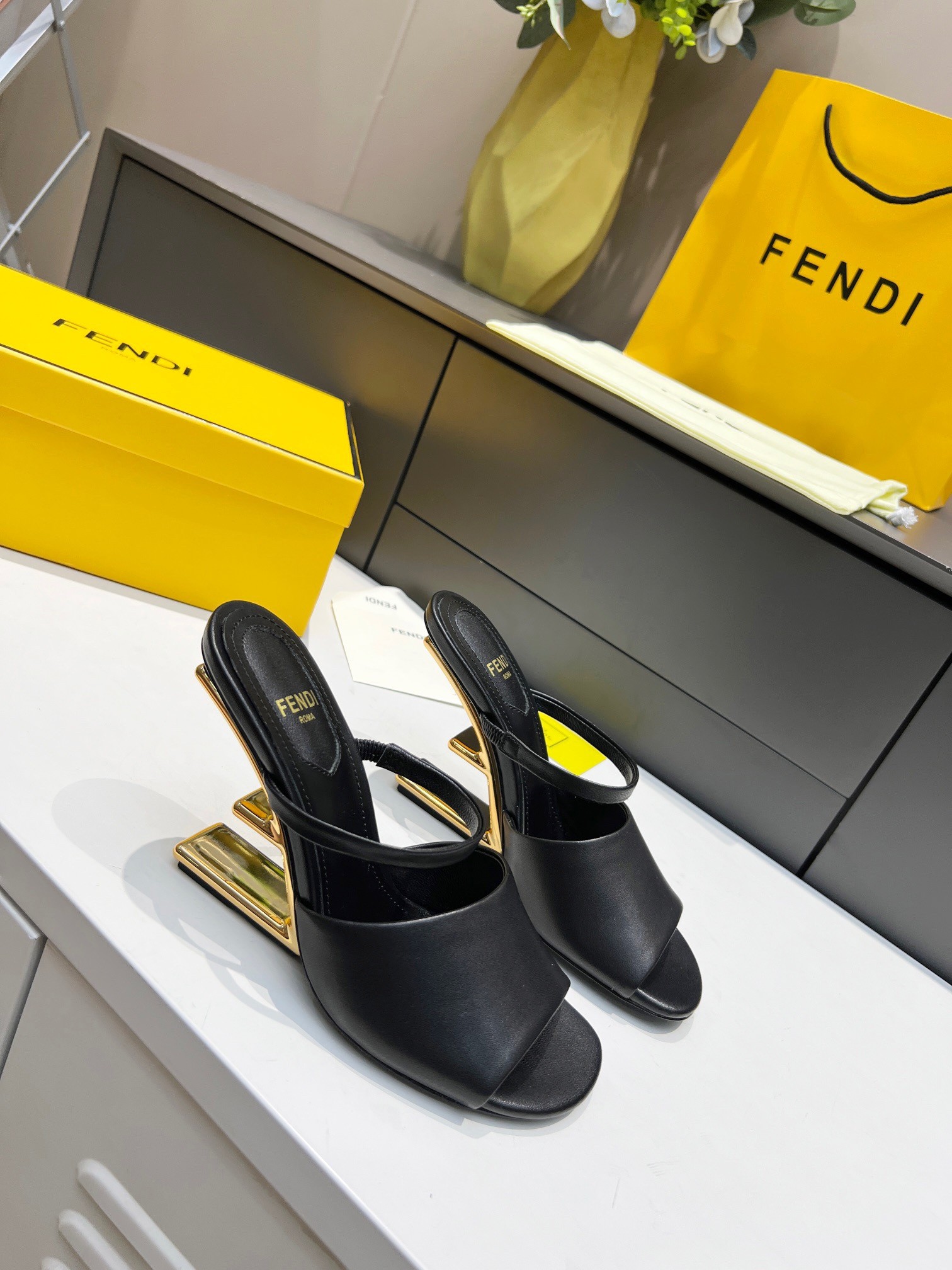F**di first sandals 95mm in black calfskin