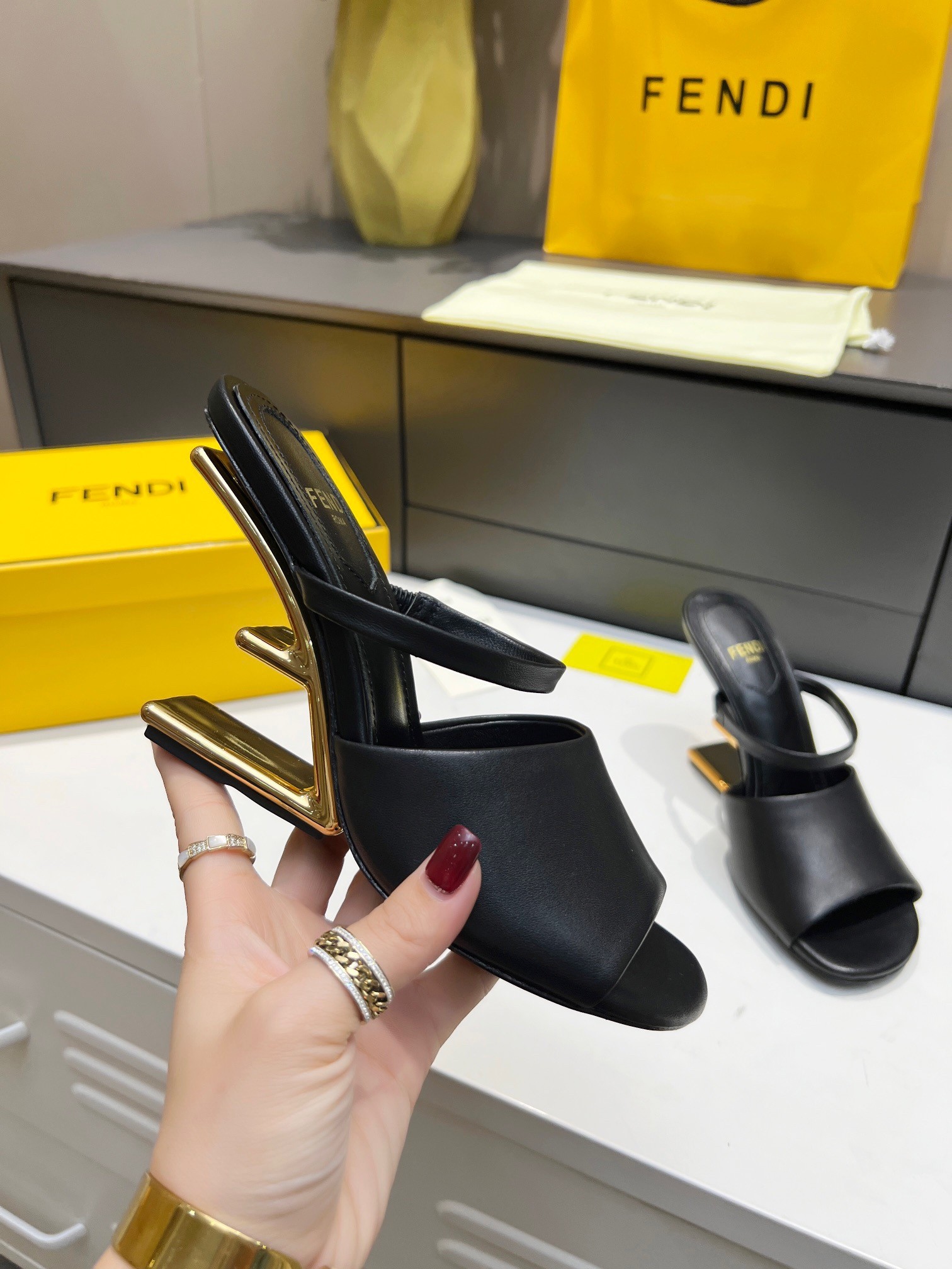 F**di first sandals 95mm in black calfskin