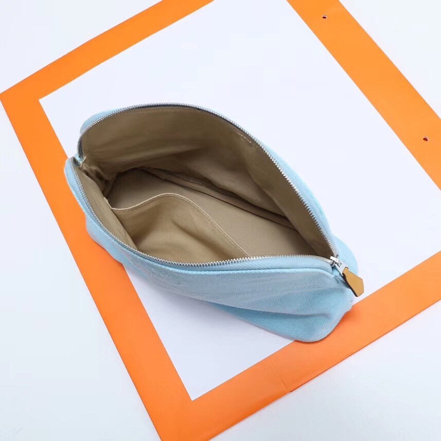 H**mes medium bolide travel case in blue lin cotton