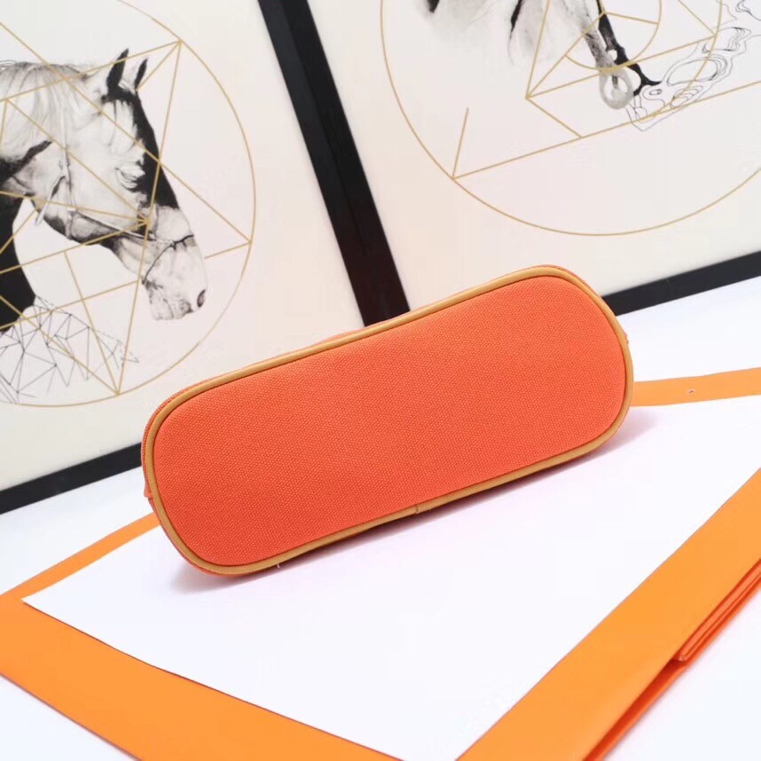 H**mes medium bolide travel case in orange cotton