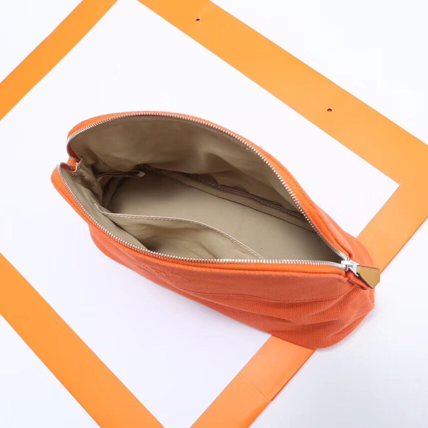 H**mes medium bolide travel case in orange cotton