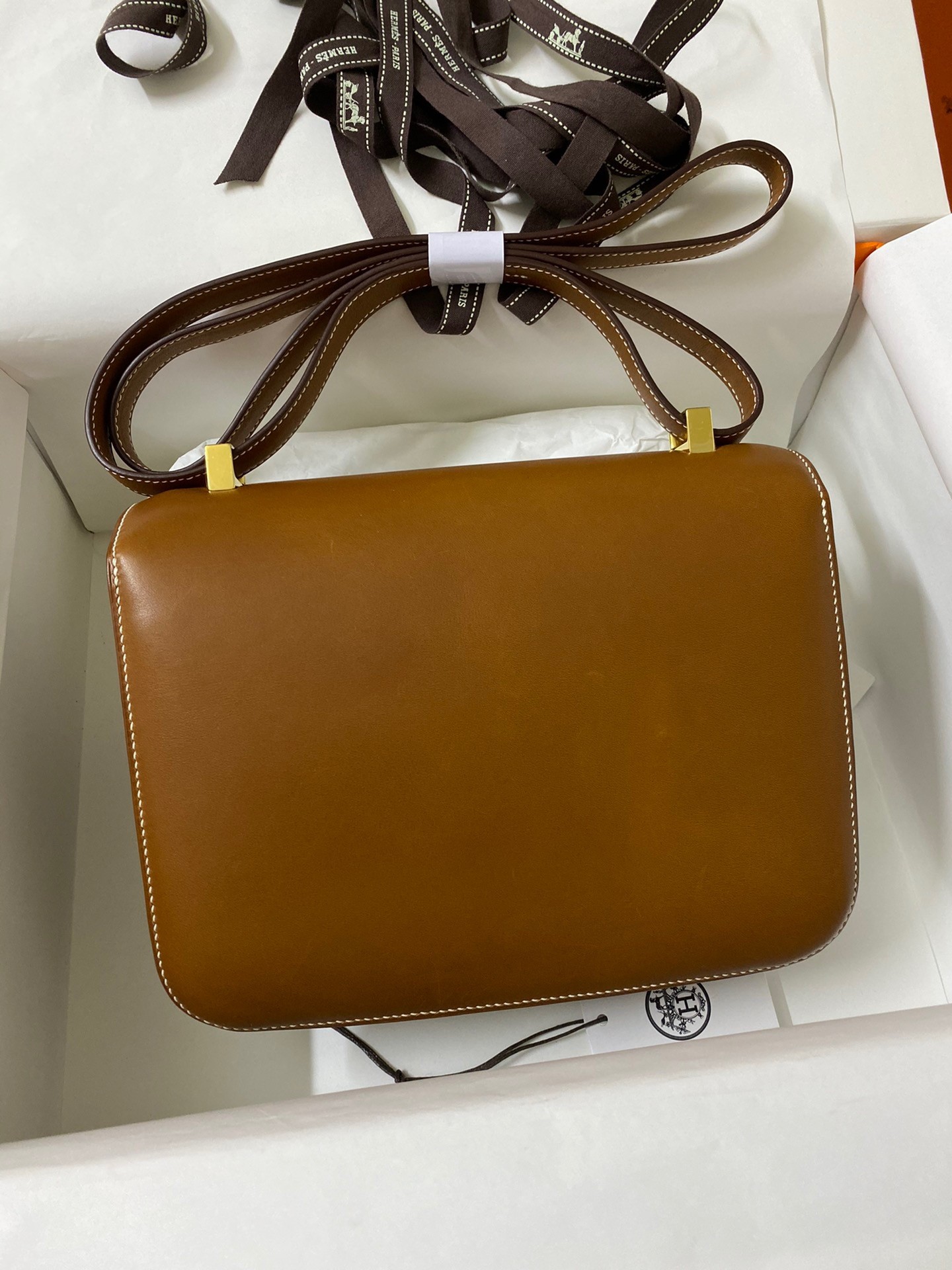 H**mes constance 24 handmade bag in gold barenia calfskin