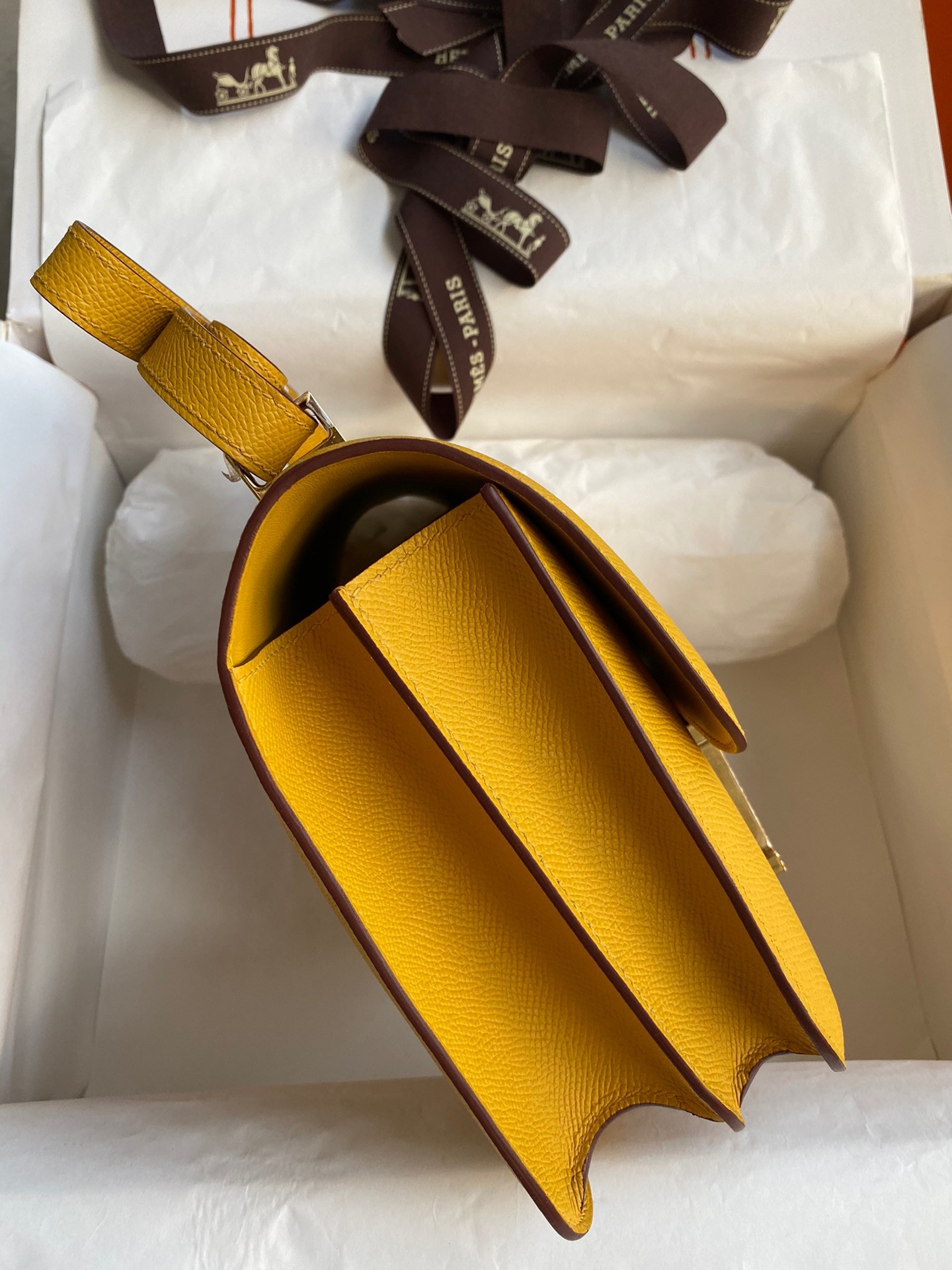 H**mes constance 24 handmade bag in jaune ambre epsom calfskin