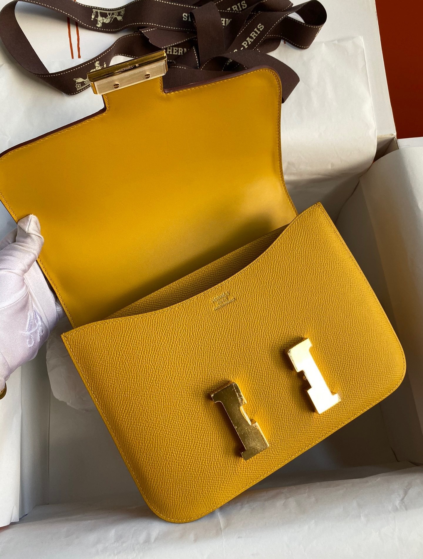 H**mes constance 24 handmade bag in jaune ambre epsom calfskin
