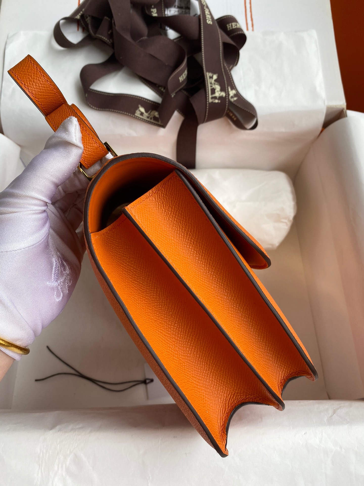 H**mes constance 24 handmade bag in orange epsom calfskin