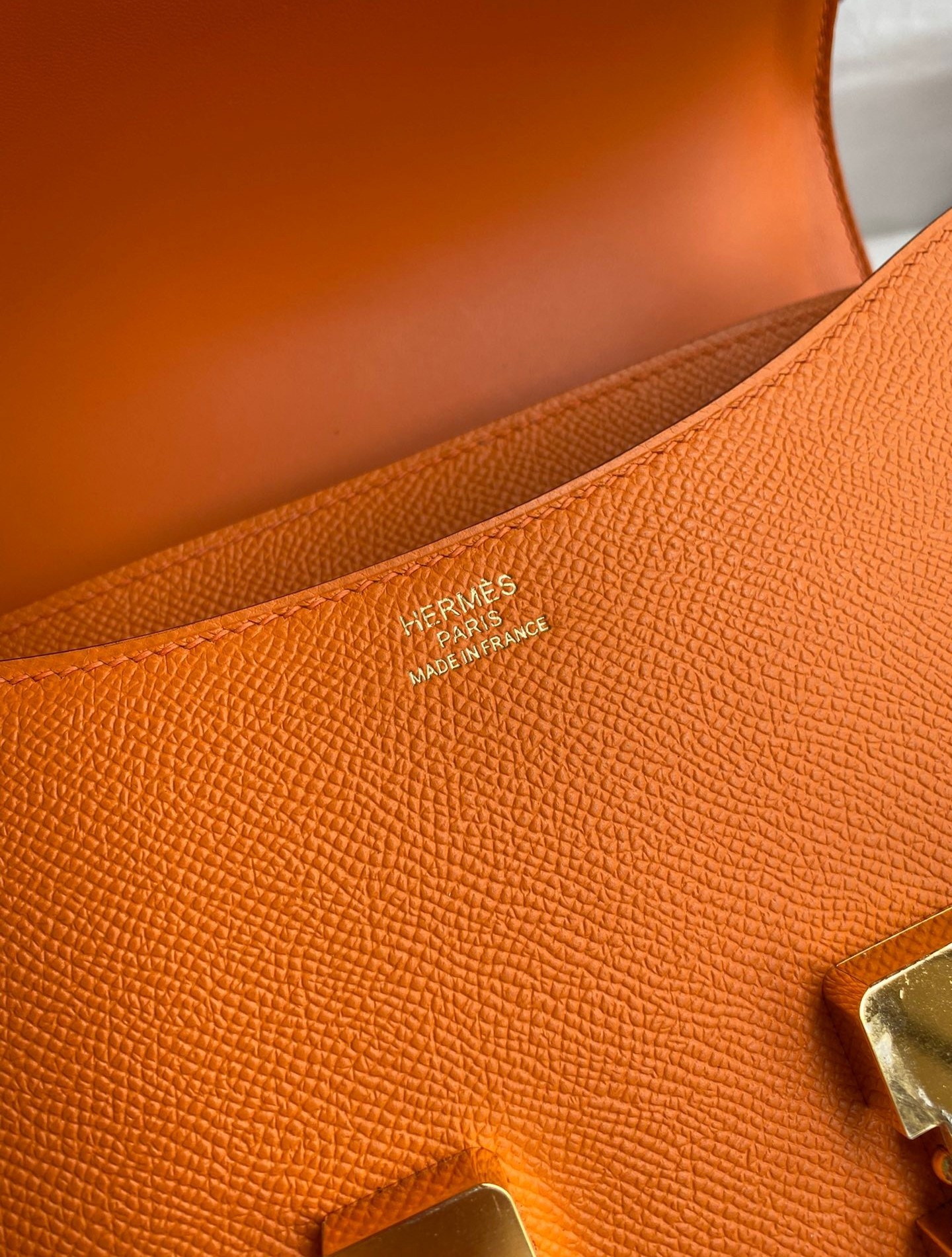 H**mes constance 24 handmade bag in orange epsom calfskin