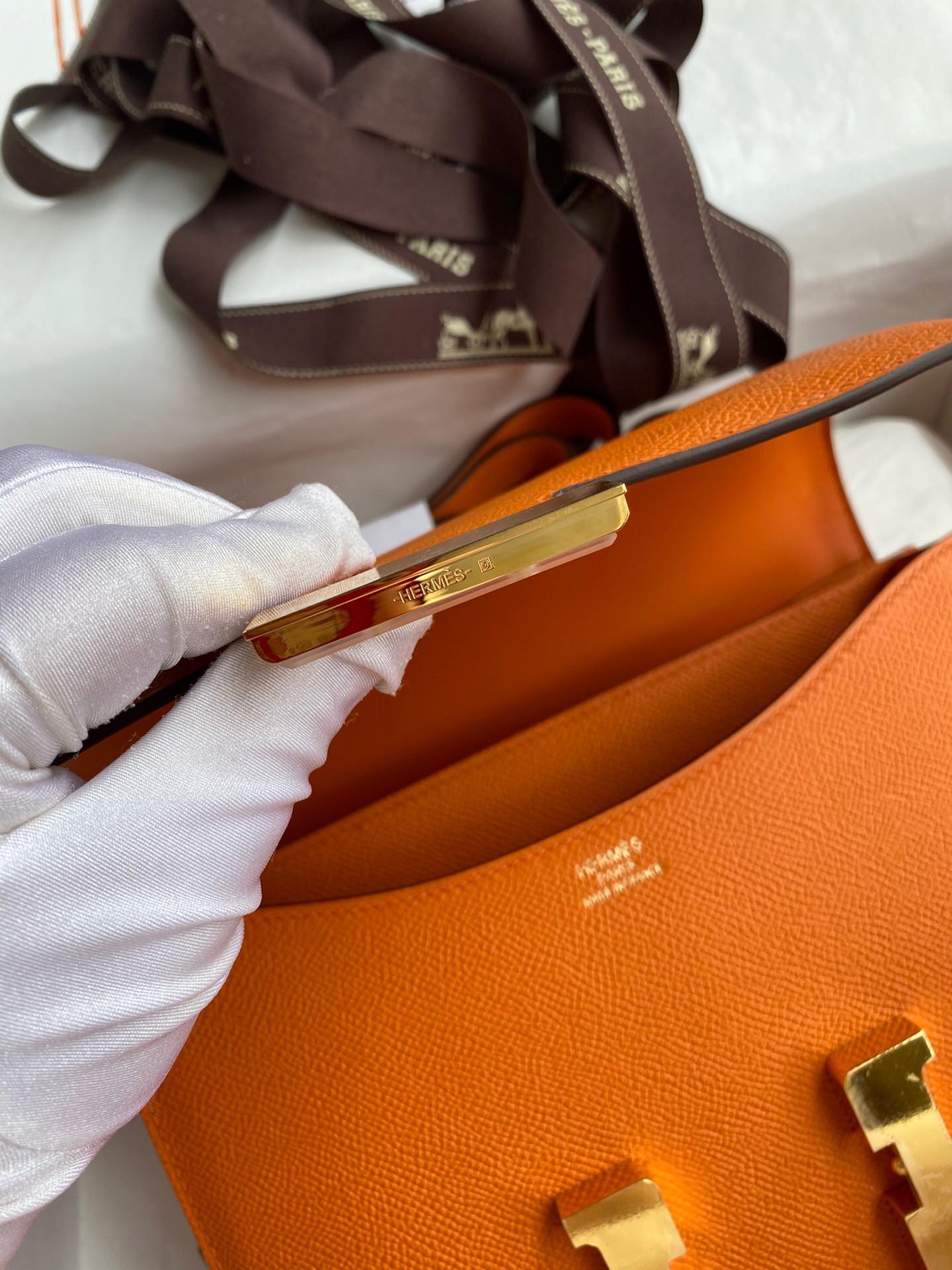 H**mes constance 24 handmade bag in orange epsom calfskin