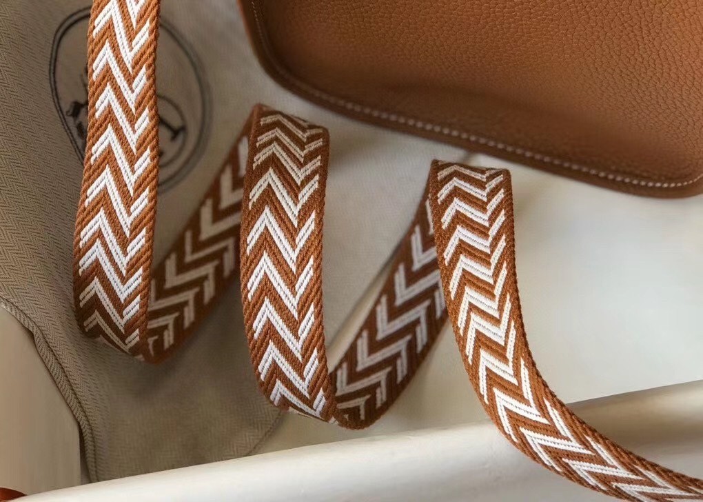 H**mes evelyne iii tpm mini bag in gold clemence leather