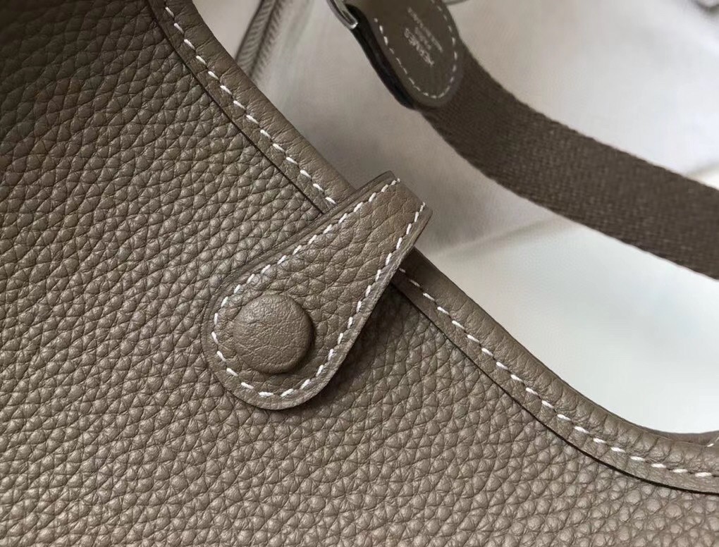 H**mes evelyne iii tpm mini bag in taupe clemence leather