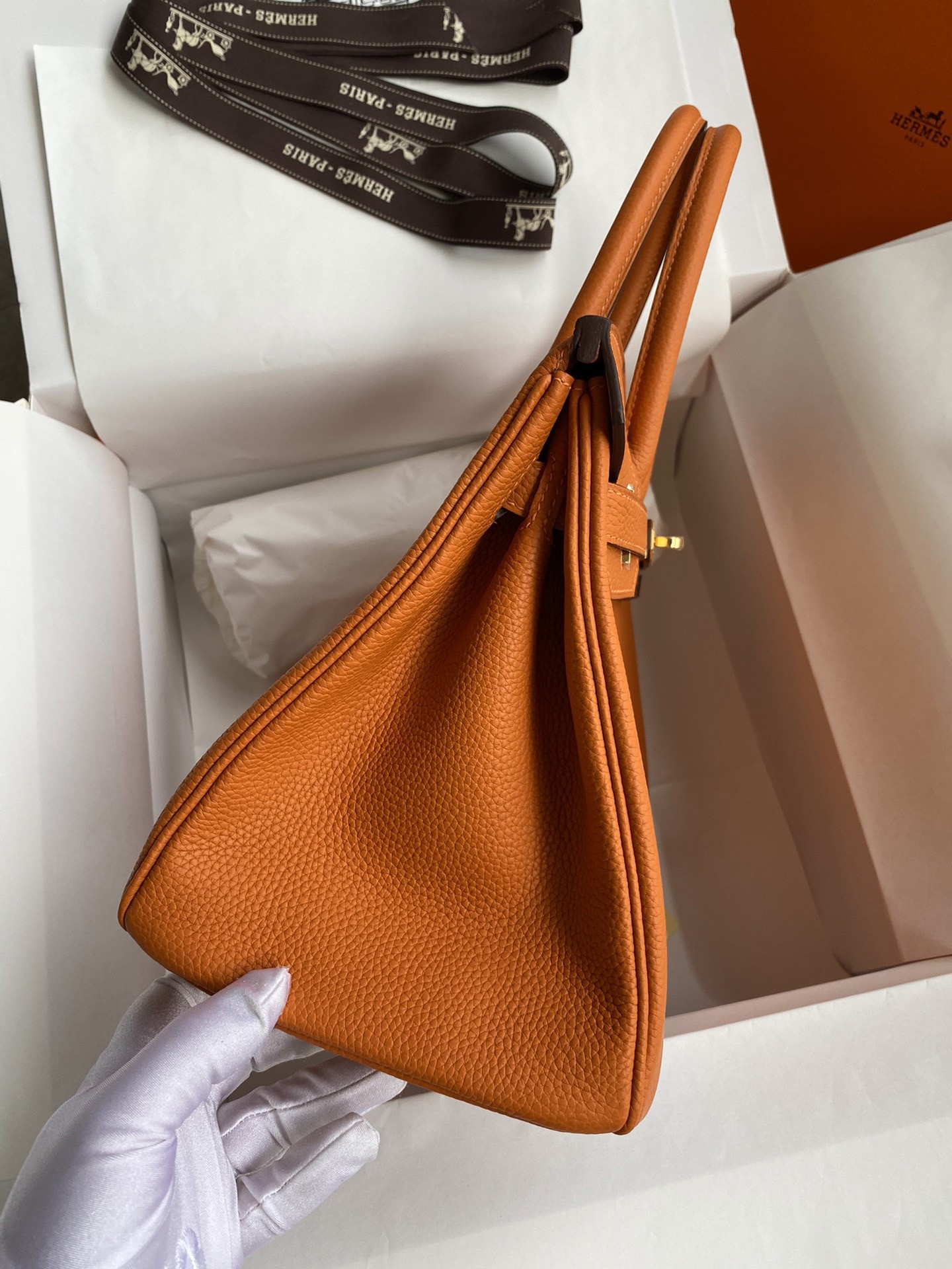 H**mes birkin 25 retourne handmade bag in orange clemence leather