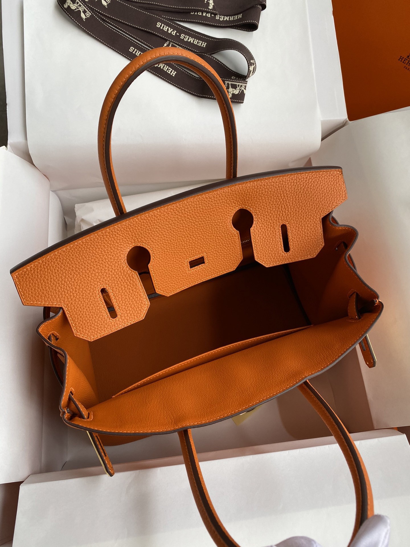 H**mes birkin 25 retourne handmade bag in orange clemence leather