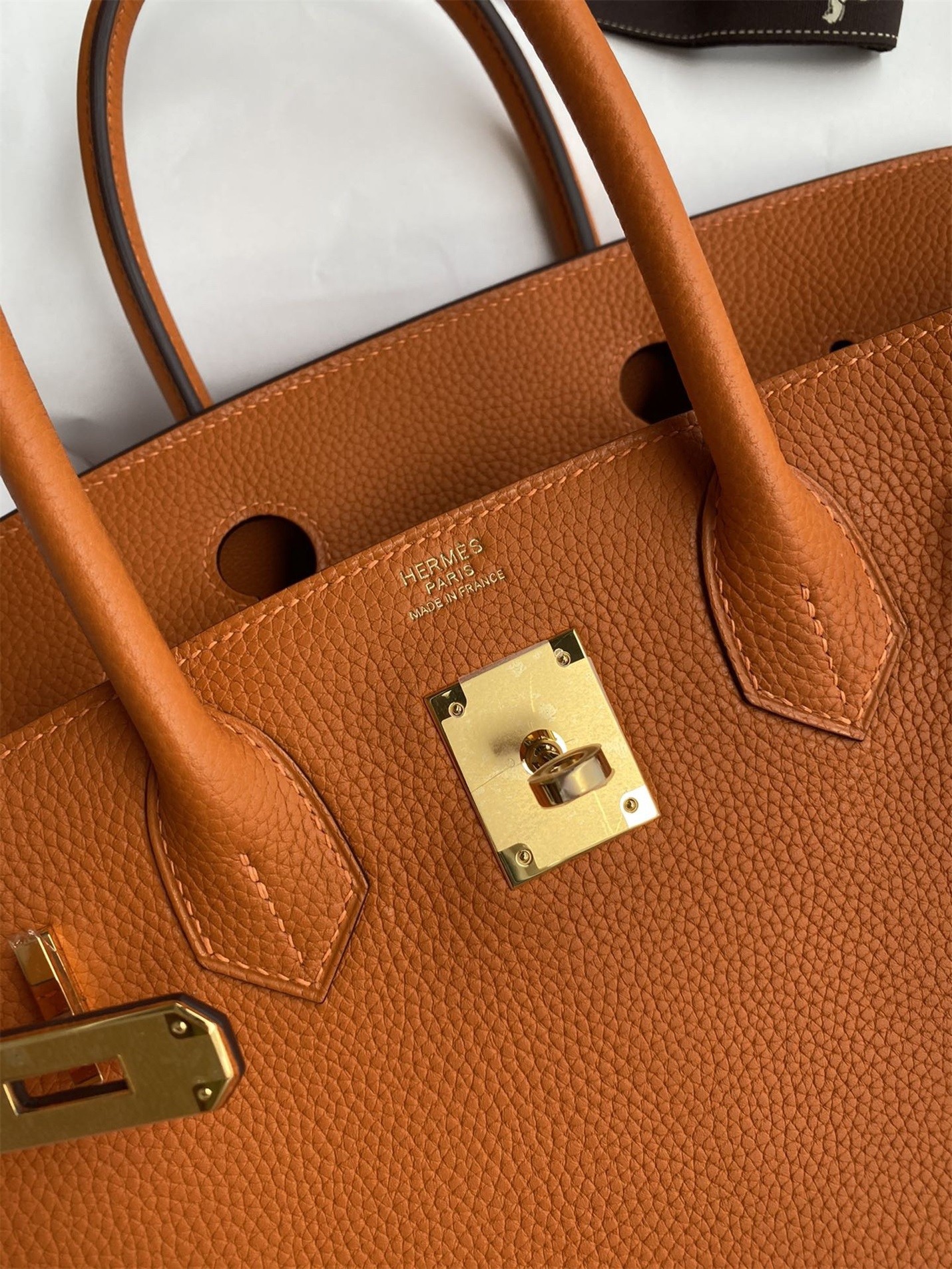 H**mes birkin 25 retourne handmade bag in orange clemence leather