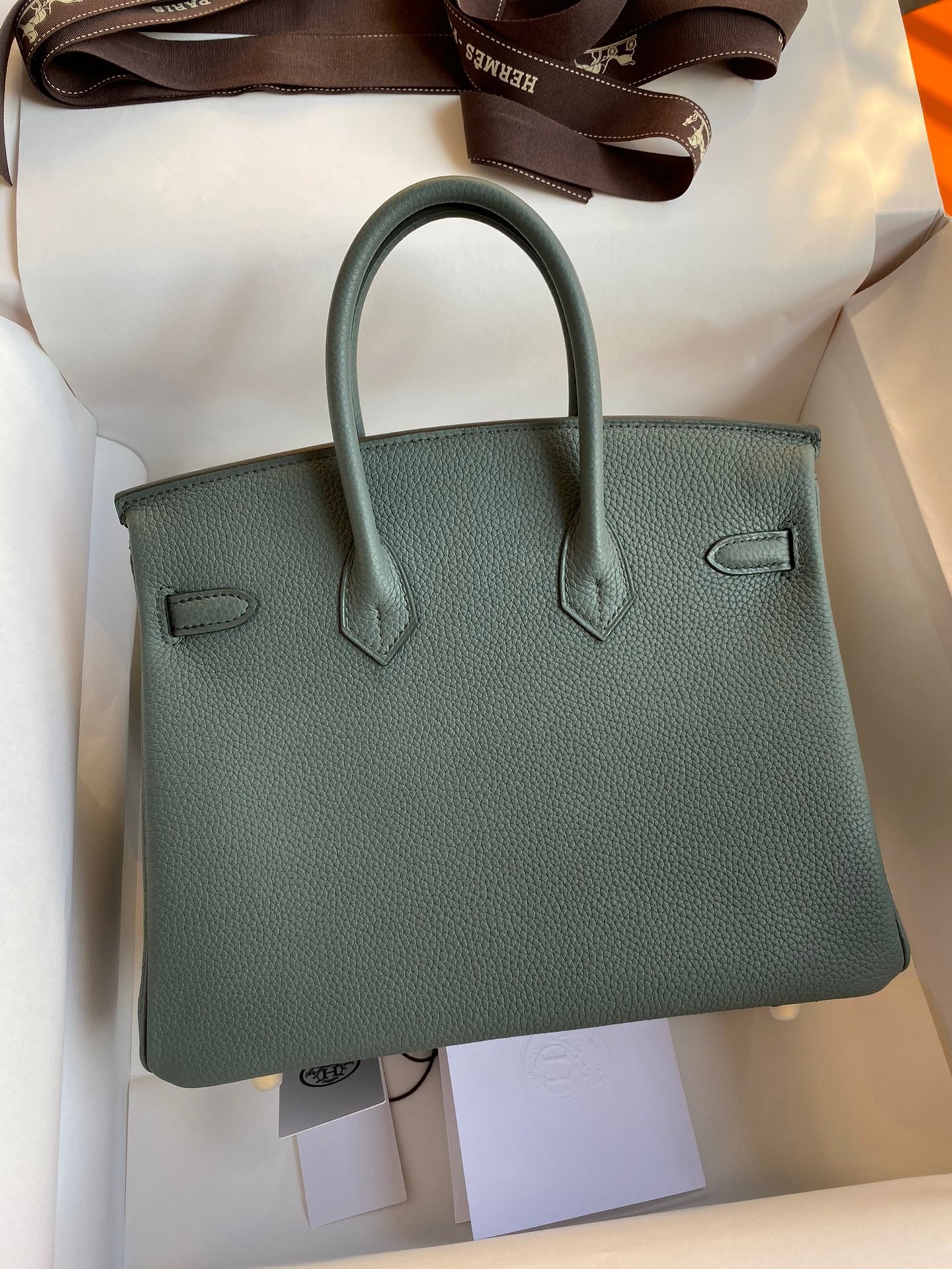 H**mes birkin 25 retourne handmade bag in vert amande clemence leather