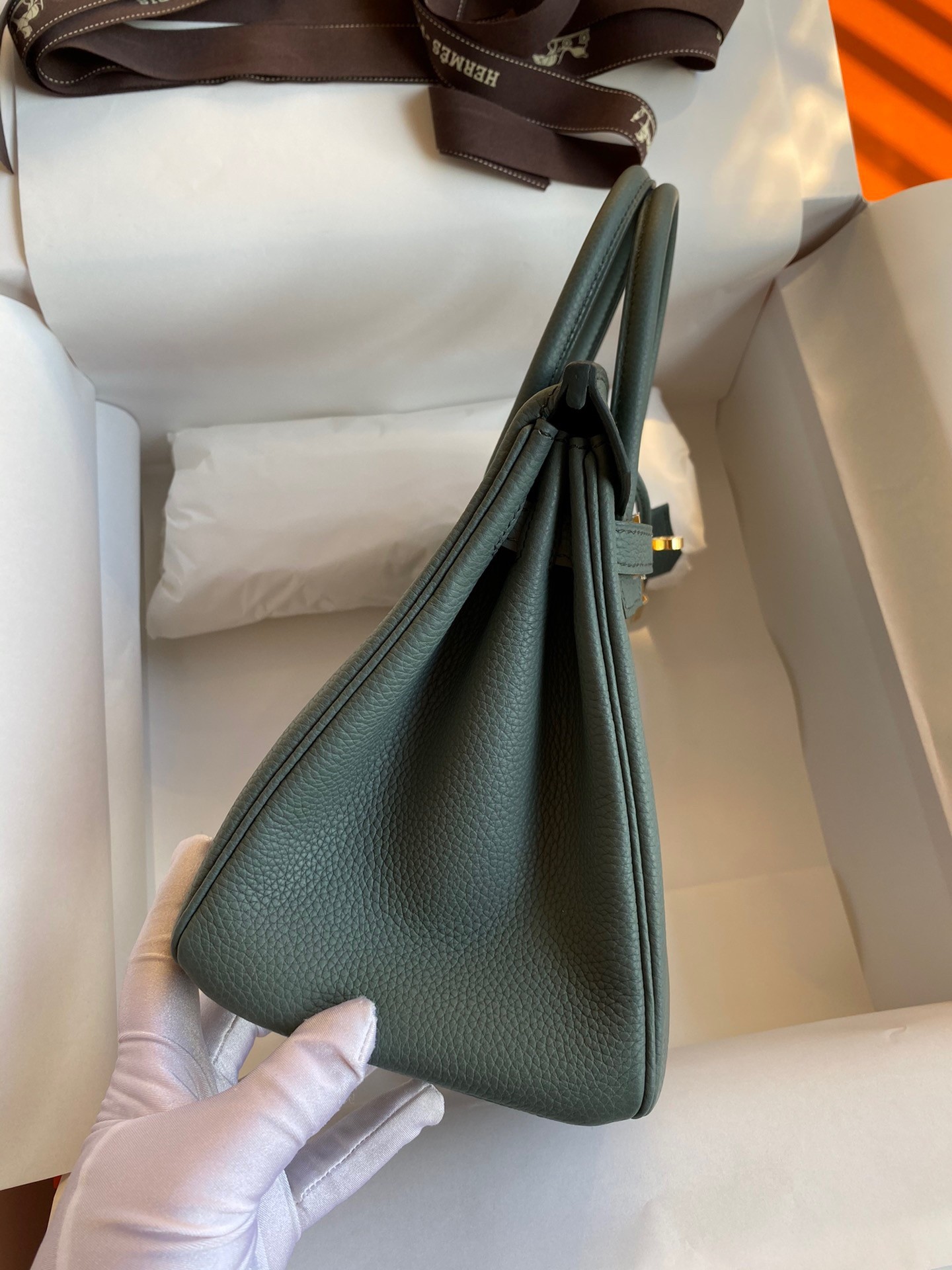 H**mes birkin 25 retourne handmade bag in vert amande clemence leather