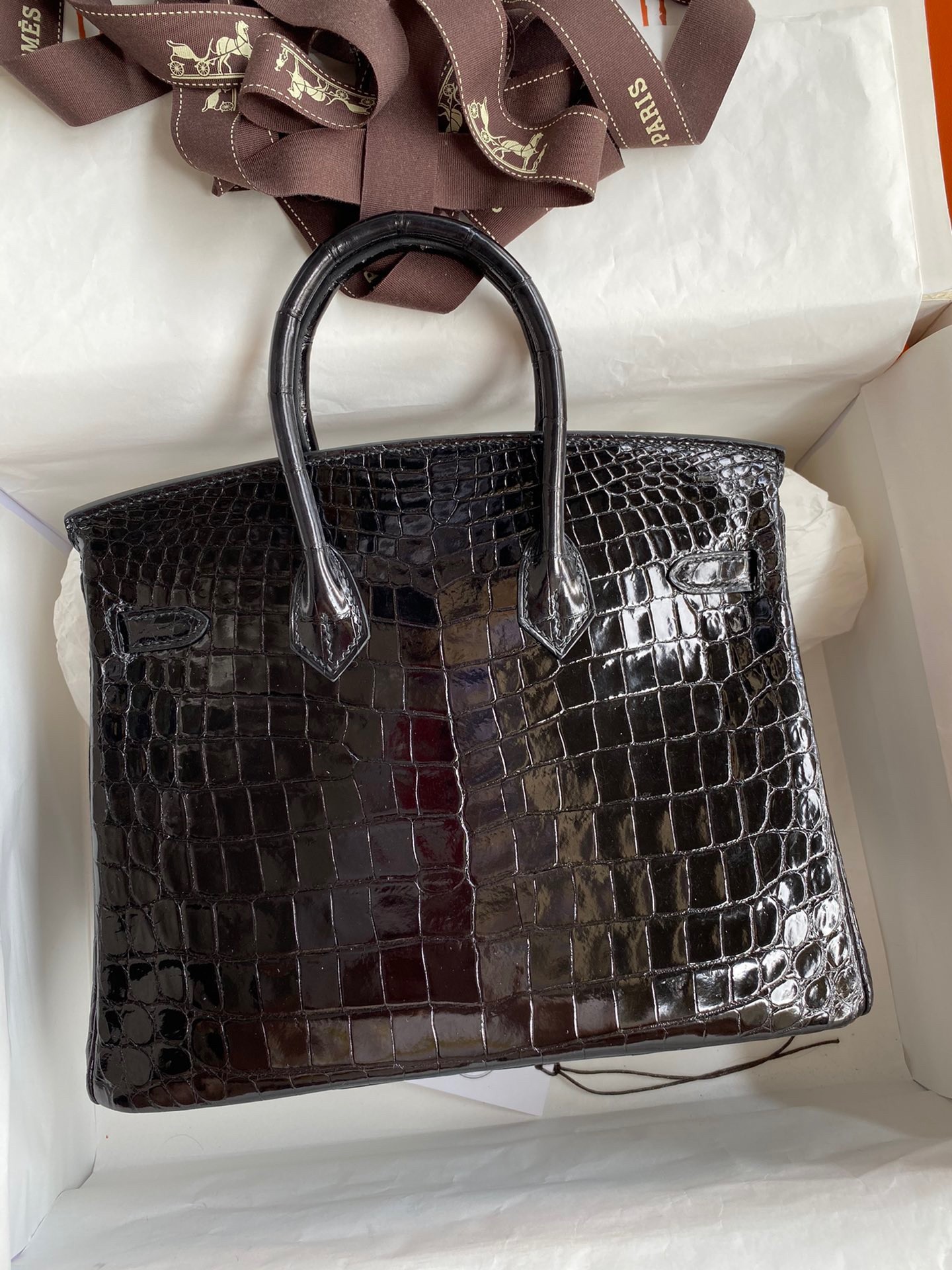 H**mes birkin 25 handmade bag in black crocodile niloticus shiny skin