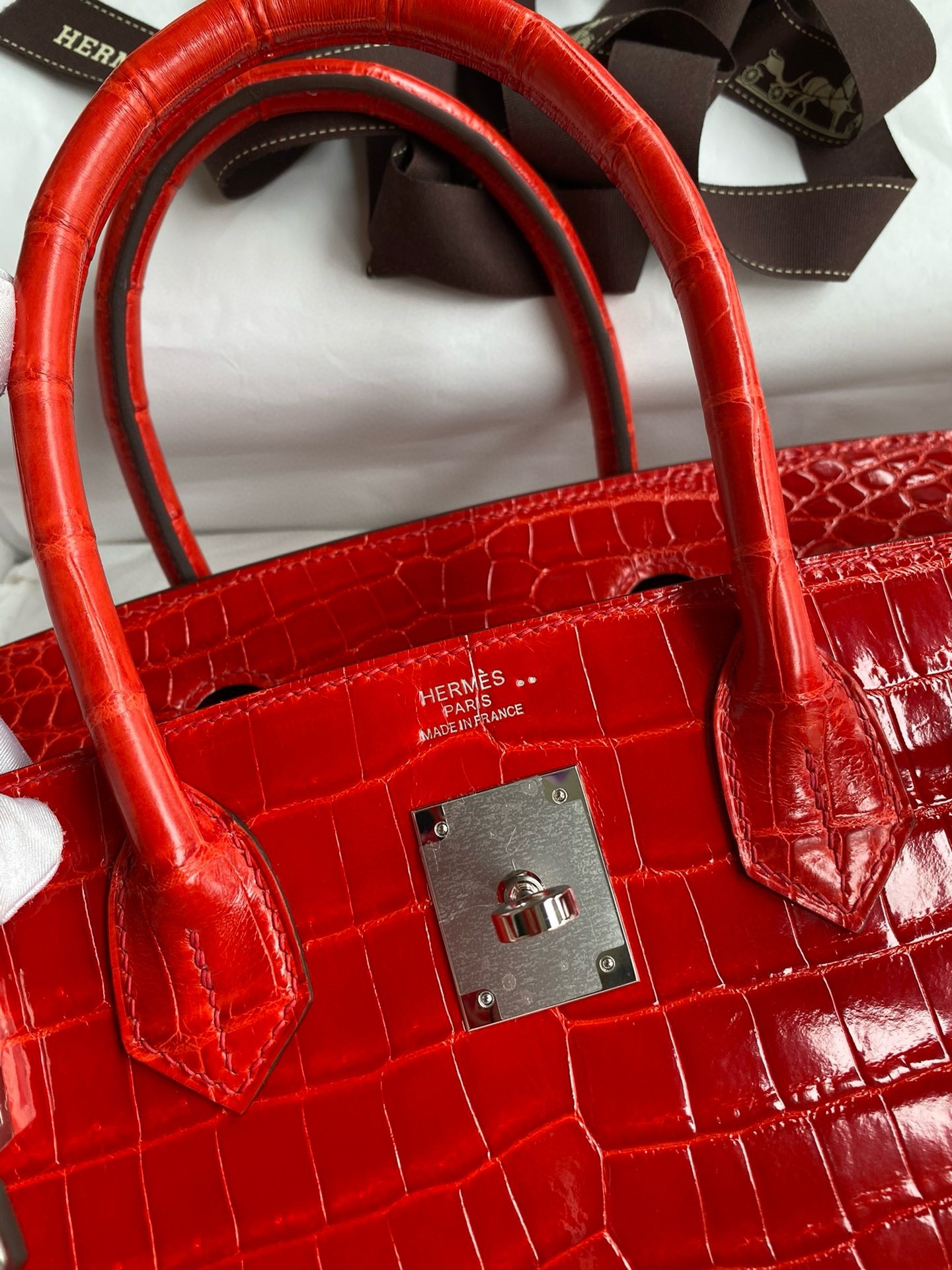 H**mes birkin 25 handmade bag in red crocodile niloticus shiny skin