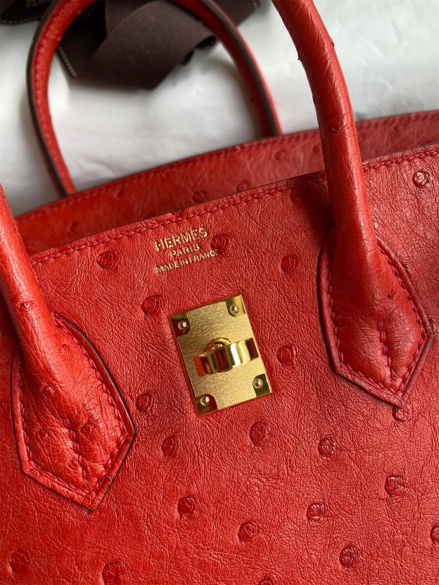 H**mes birkin 25 retourne handmade bag in red ostrich leather