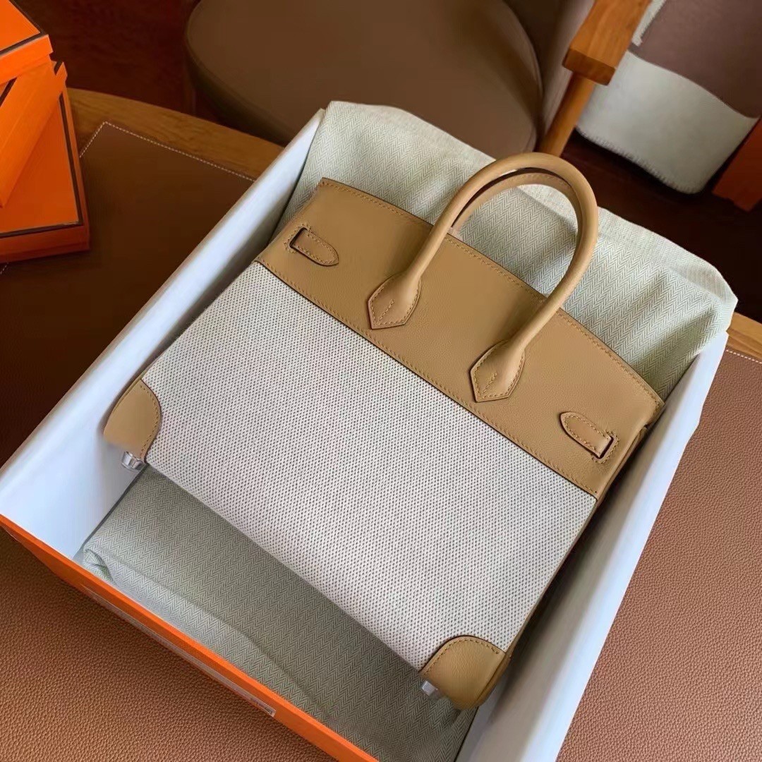 H**mes birkin 25 handmade bag in toile & biscuit swift leather