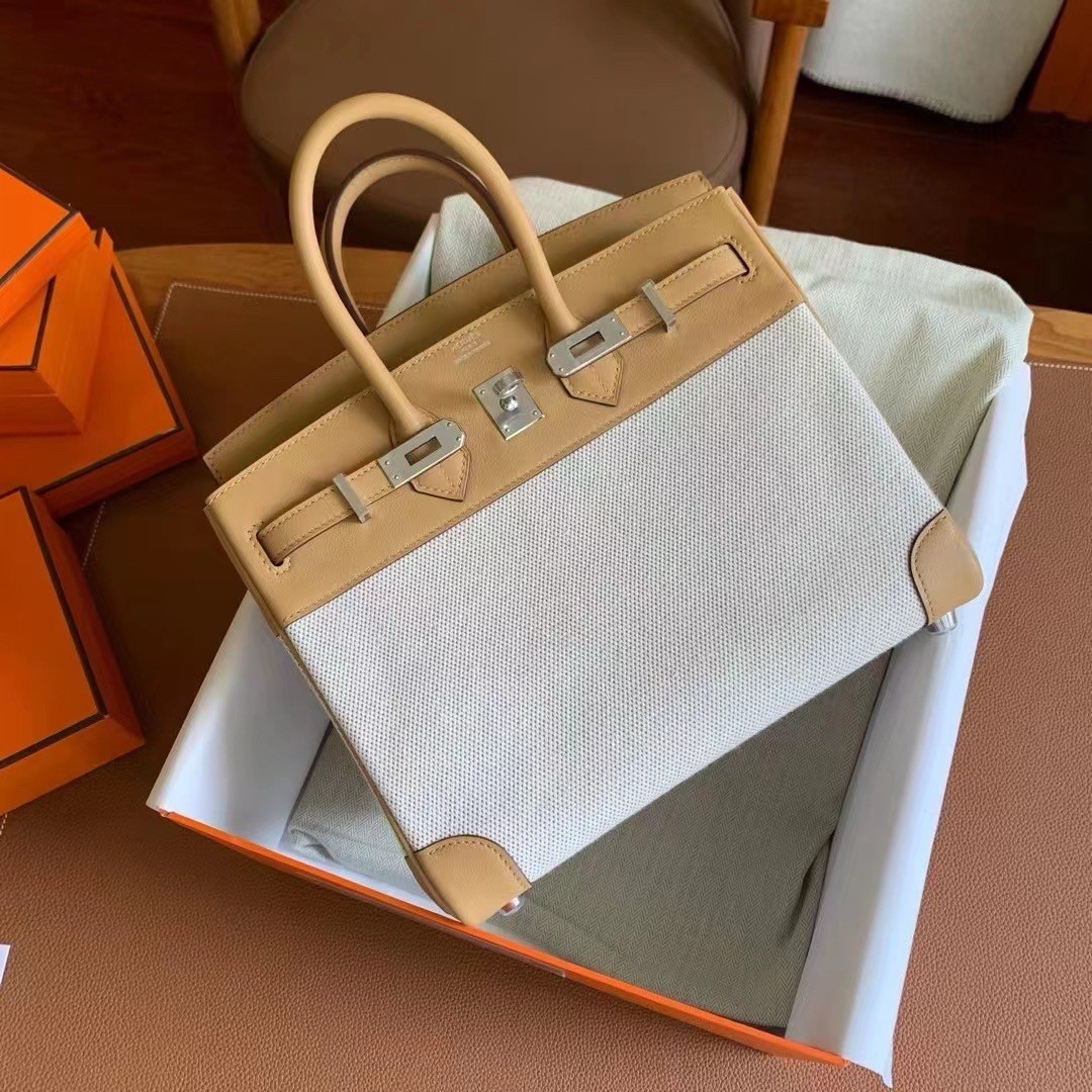 H**mes birkin 25 handmade bag in toile & biscuit swift leather