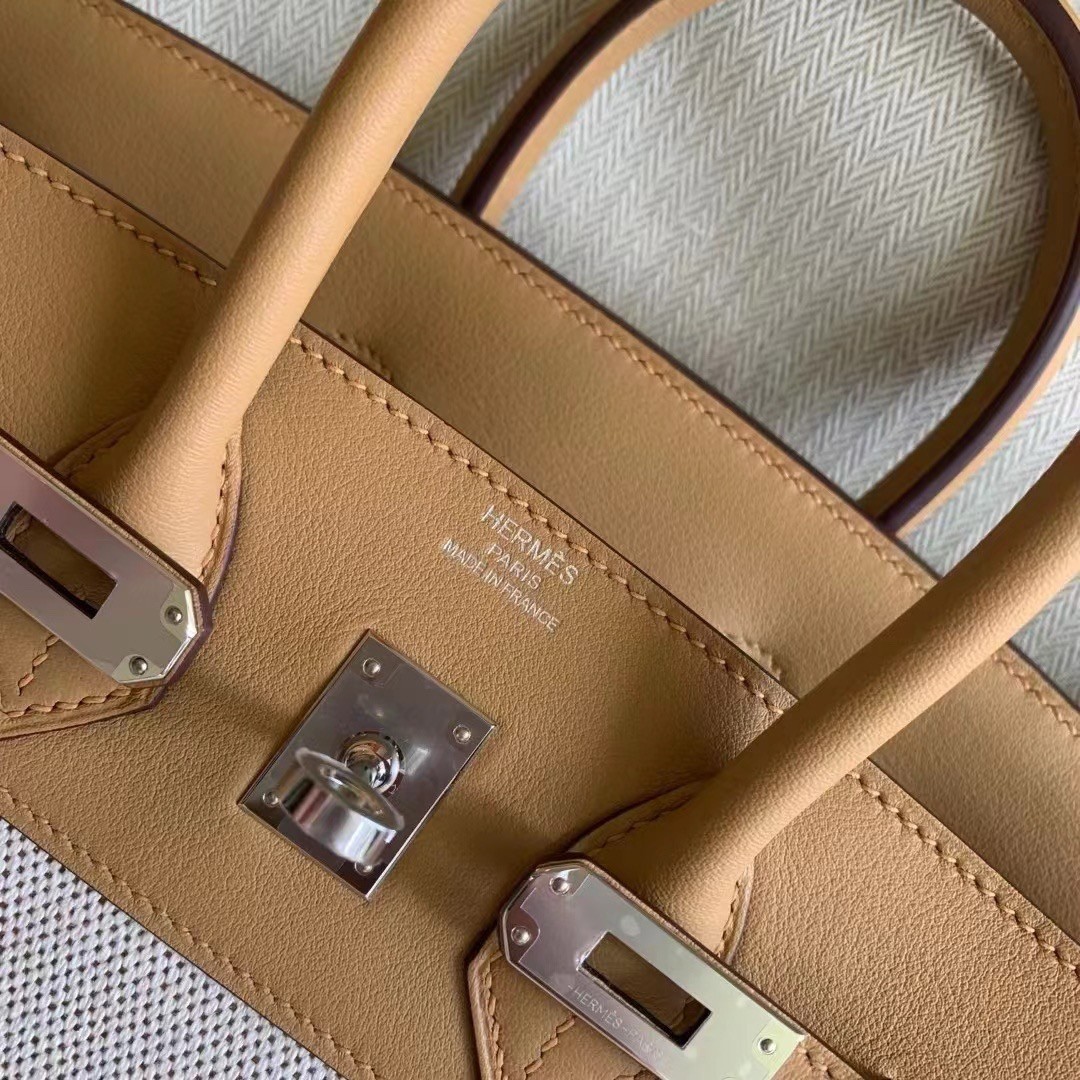 H**mes birkin 25 handmade bag in toile & biscuit swift leather